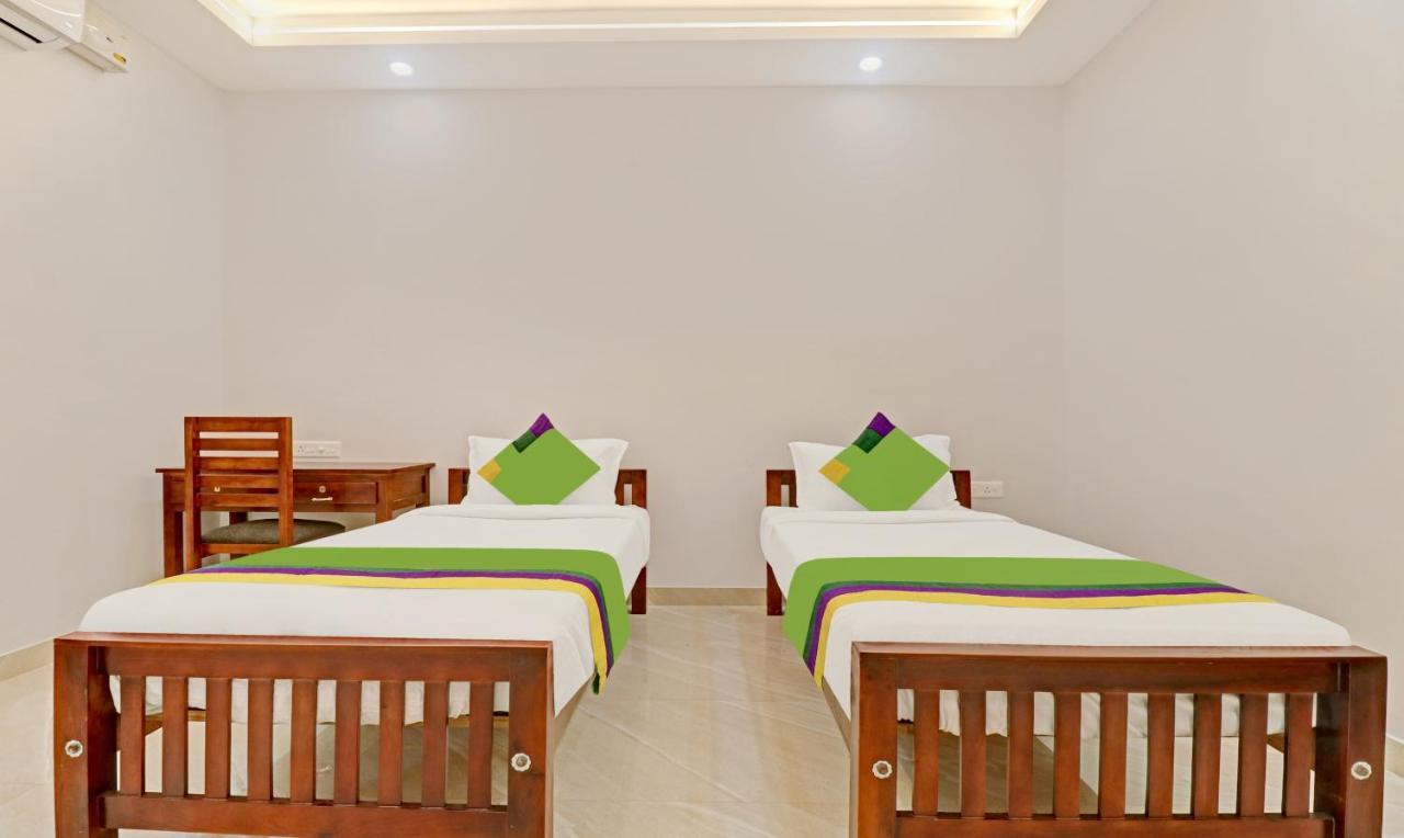 Itsy Hotels Palm Grove By D2V Kochi Bagian luar foto