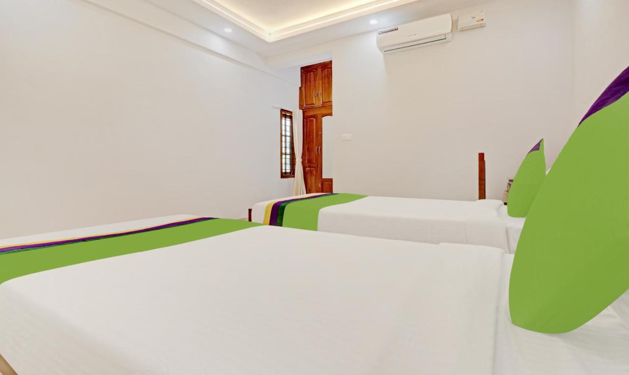 Itsy Hotels Palm Grove By D2V Kochi Bagian luar foto